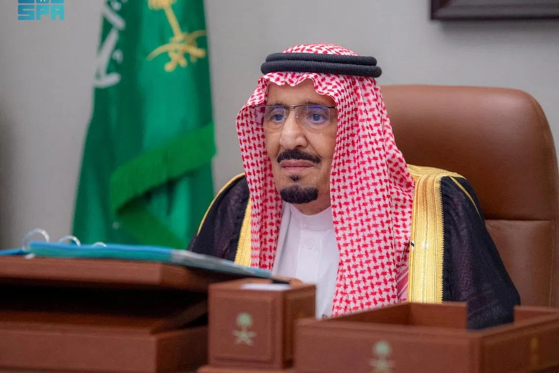 FILE PHOTO: Saudi King Salman bin Abdulaziz chairs a virtual cabinet meeting from his office in Jeddah, Saudi Arabia, May 28, 2024. Saudi Press Agency/Handout via REUTERS/File Photo