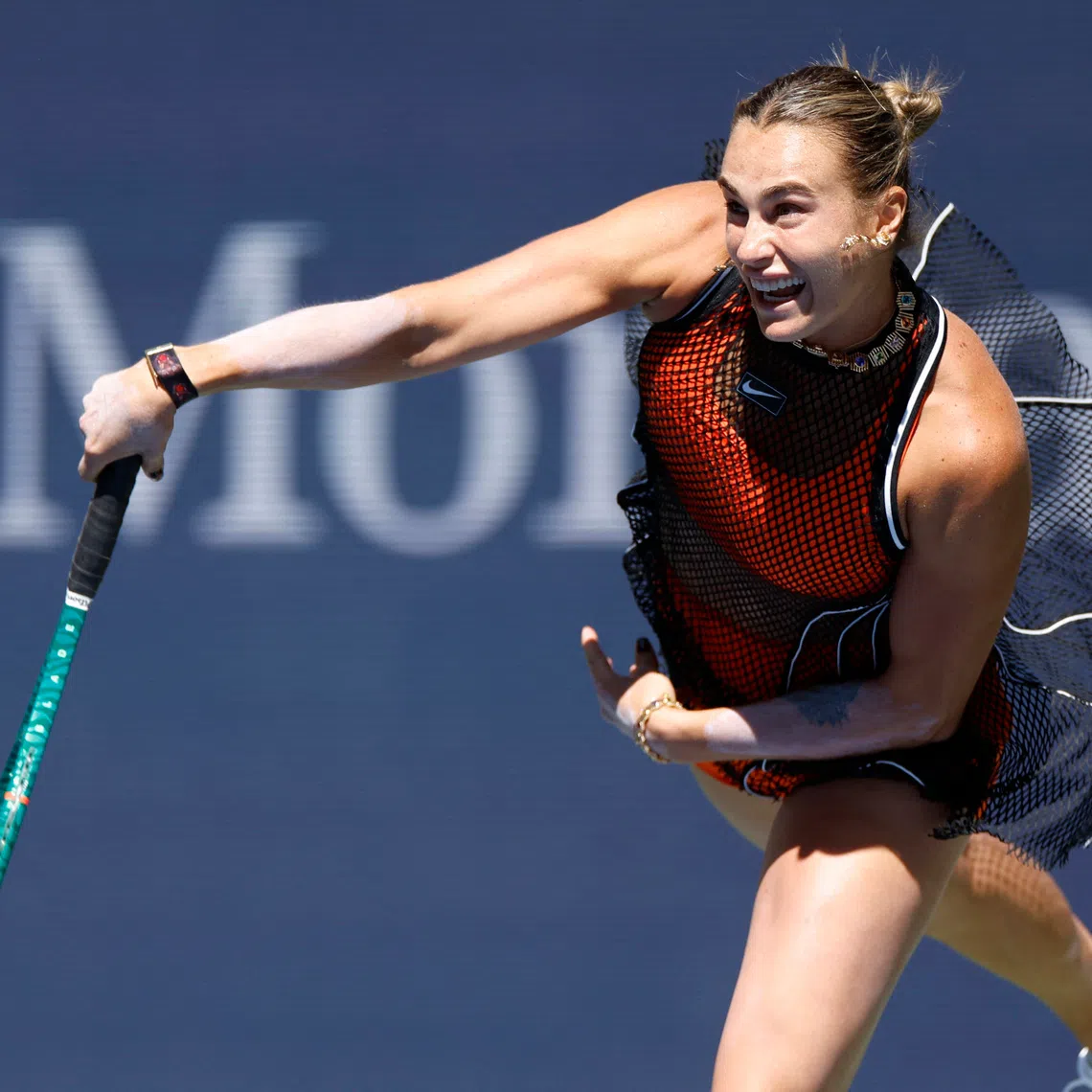Tennis - U.S. Open - Flushing Meadows, New York, United States - August 25, 2026 Belarus' Aryna Sabalenka in action during her mixed doubles round of 16 match with Serbia's Novak Djokovic against Britain's Henry Patten and Czech Republic's Katerina Siniakova REUTERS/Eduardo Munoz