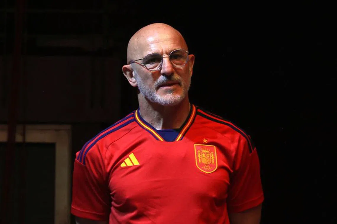 FILE PHOTO: Soccer Football - UEFA Nations League - Spain celebrate winning the UEFA Nations League - Madrid, Spain - June 19, 2023 Spain coach Luis de la Fuente celebrates winning the UEFA Nations League in Madrid REUTERS/Miguel Gutierrez/File photo