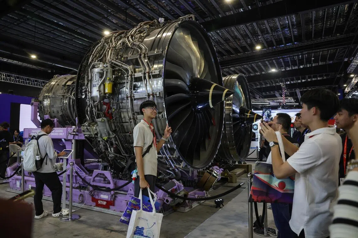 Take a good look at an actual life-sized aircraft engine at the Rolls-Royce booth.