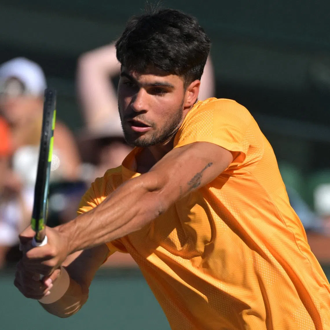 Mar 11, 2026; Indian Wells, CA, USA;  Carlos Alcaraz (ESP) hits a shot as he defeated Casper Ruud (NOR) during the fourth round in the BNP Paribas Open at the Indian Wells Tennis Garden. Mandatory Credit: Jayne Kamin-Oncea-Imagn Images