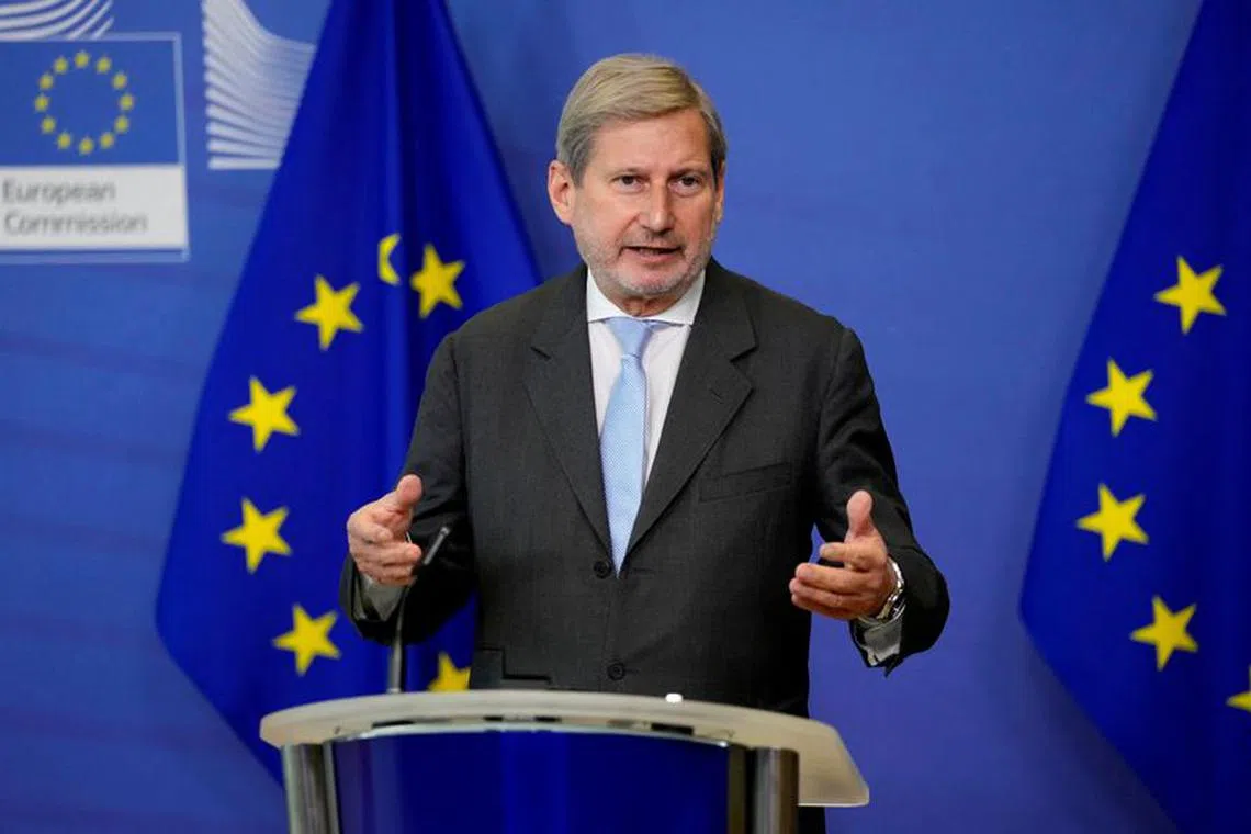 FILE PHOTO: European Commissioner for Budget and Administration Johannes Hahn speaks during a news conference at the EU headquarters in Brussels, Belgium December 22, 2021. Virginia Mayo/Pool via REUTERS/File Photo