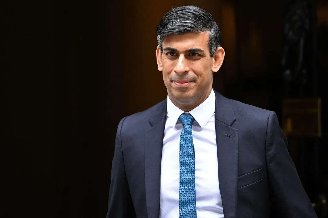 (FILES) Britain's Prime Minister Rishi Sunak leaves 10 Downing Street in central London on July 19, 2023 on his way to take part in the weekly session of Prime Minister's Questions (PMQs) in the House of Commons. The UK government said on July 31, 2023, it would issue "hundreds" of new oil and gas licences in the North Sea to secure energy reserves while still aiming for net zero carbon emissions by 2050. (Photo by JUSTIN TALLIS / AFP)