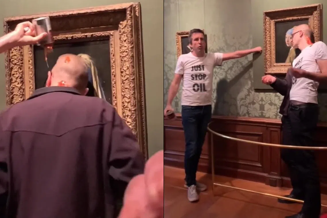 One activist glued his head to glass covering the world-famous Vermeer painting, while a second 
glued his hand to the wall.