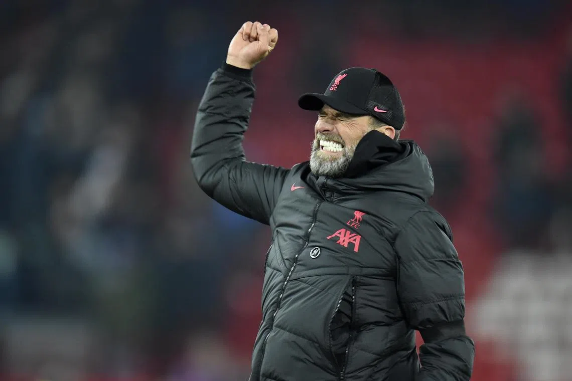 Liverpool manager Jurgen Klopp celebrates after winning  against city rivals Everton.
