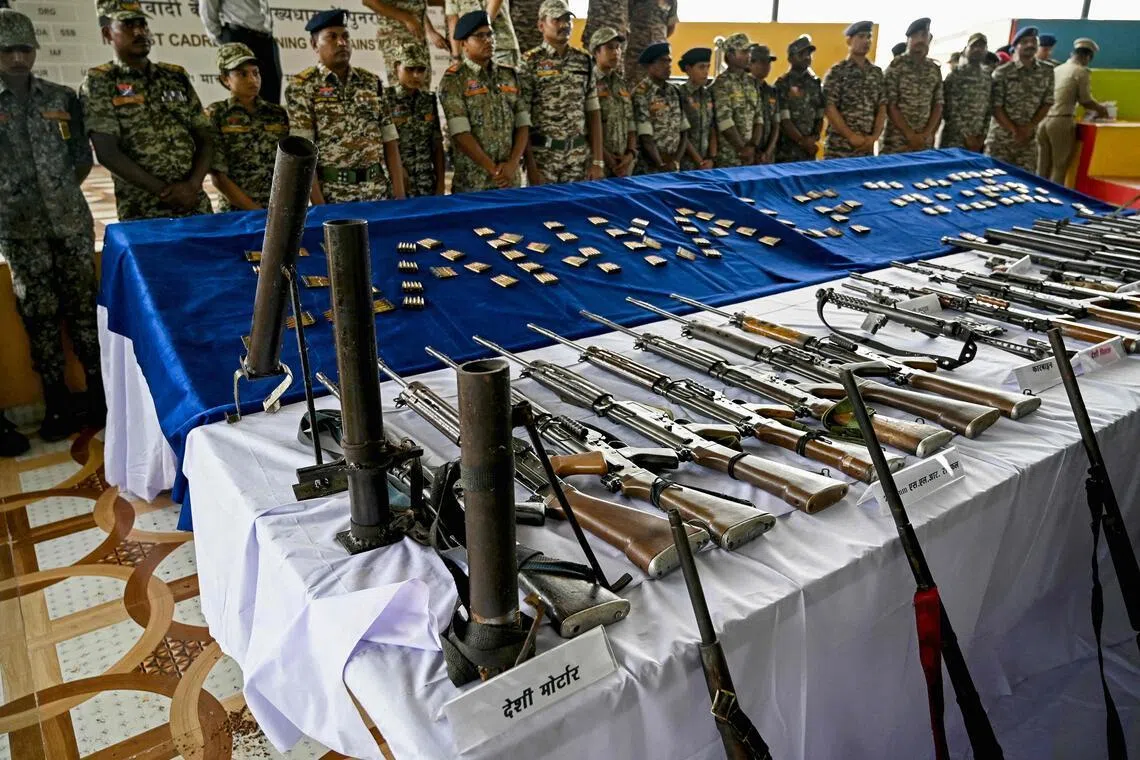 Seized weapons on display after India declares end to Maoist insurgency