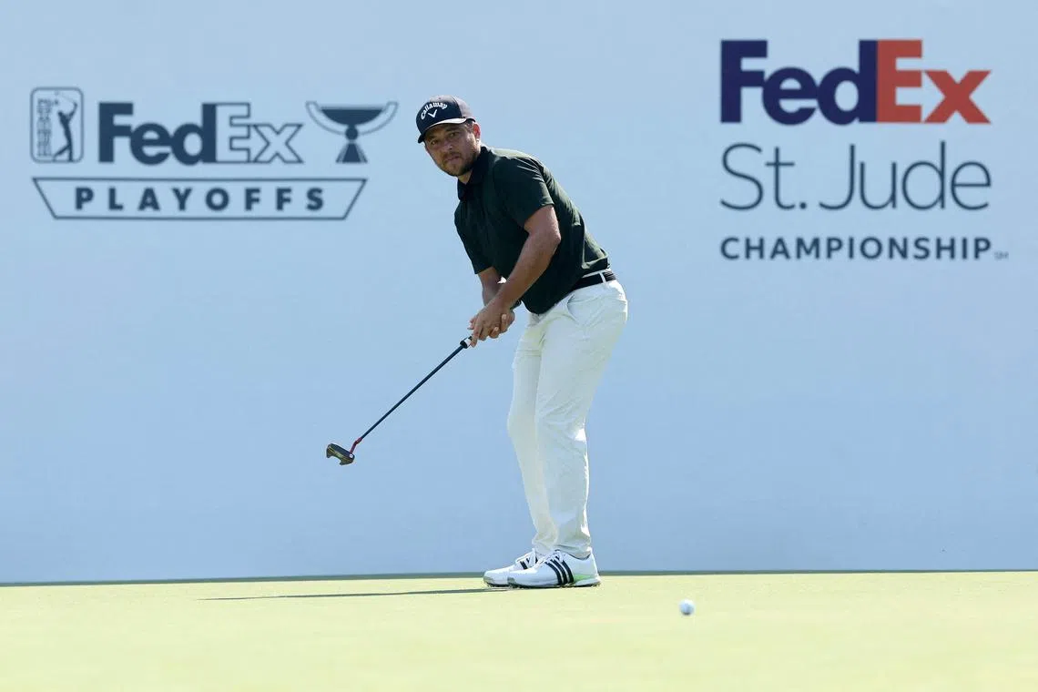 Xander Schauffele of the United States putts on the 17th green during the final round of the FedEx St. Jude Championship on Aug 18, 2024.