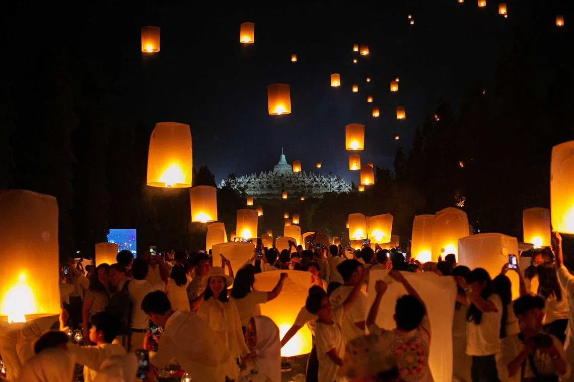 Buddhist devotees releasing lanterns in celebration of Vesak day at Borobudur temple in Magelang, Central Java, Indonesia, June 4.