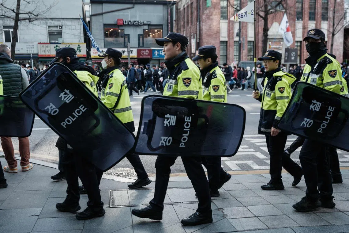 Seoul's police planned on deploying some 14,000 officers, an increase from the initial 12,000 officers. 