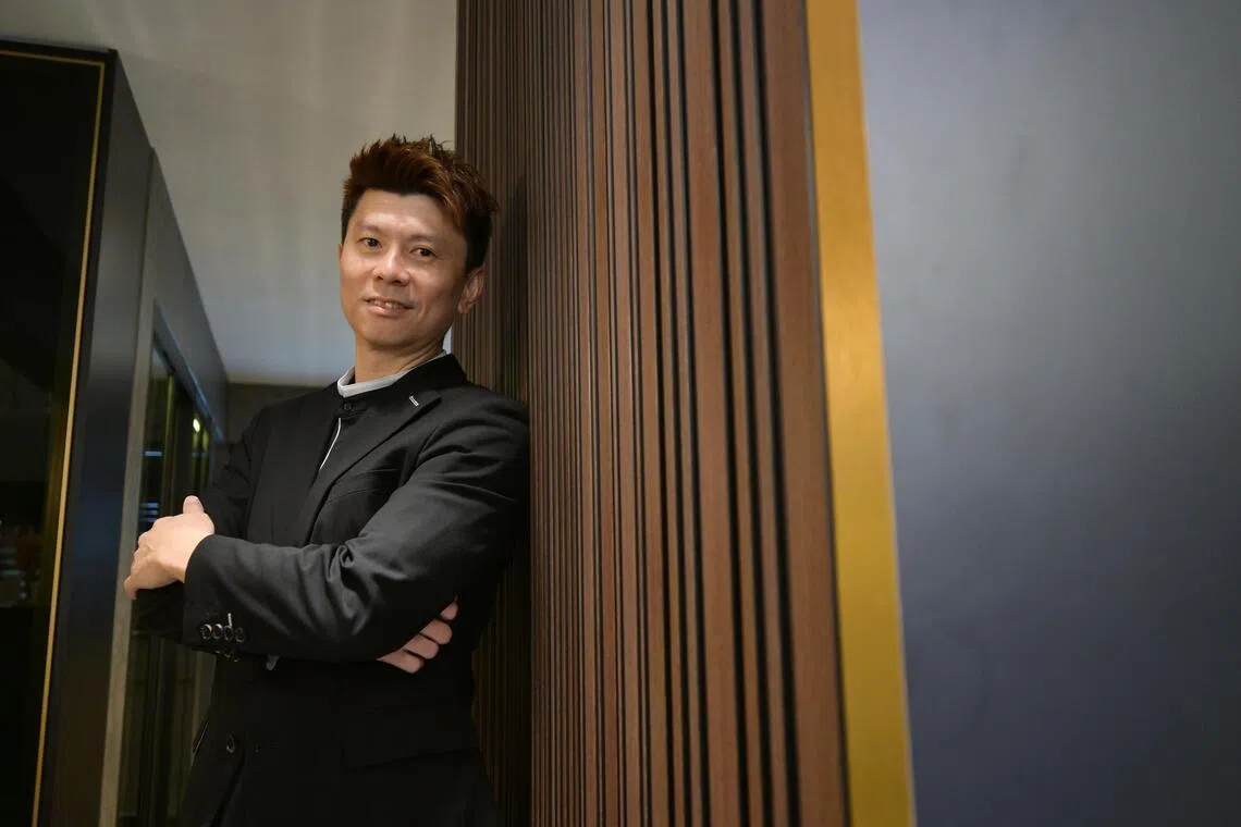Mr Russell Chin, founder and managing director of Inspire ID Group, started out selling aluminium gates and window frames in his twenties. ST Photo: Ng Sor Luan