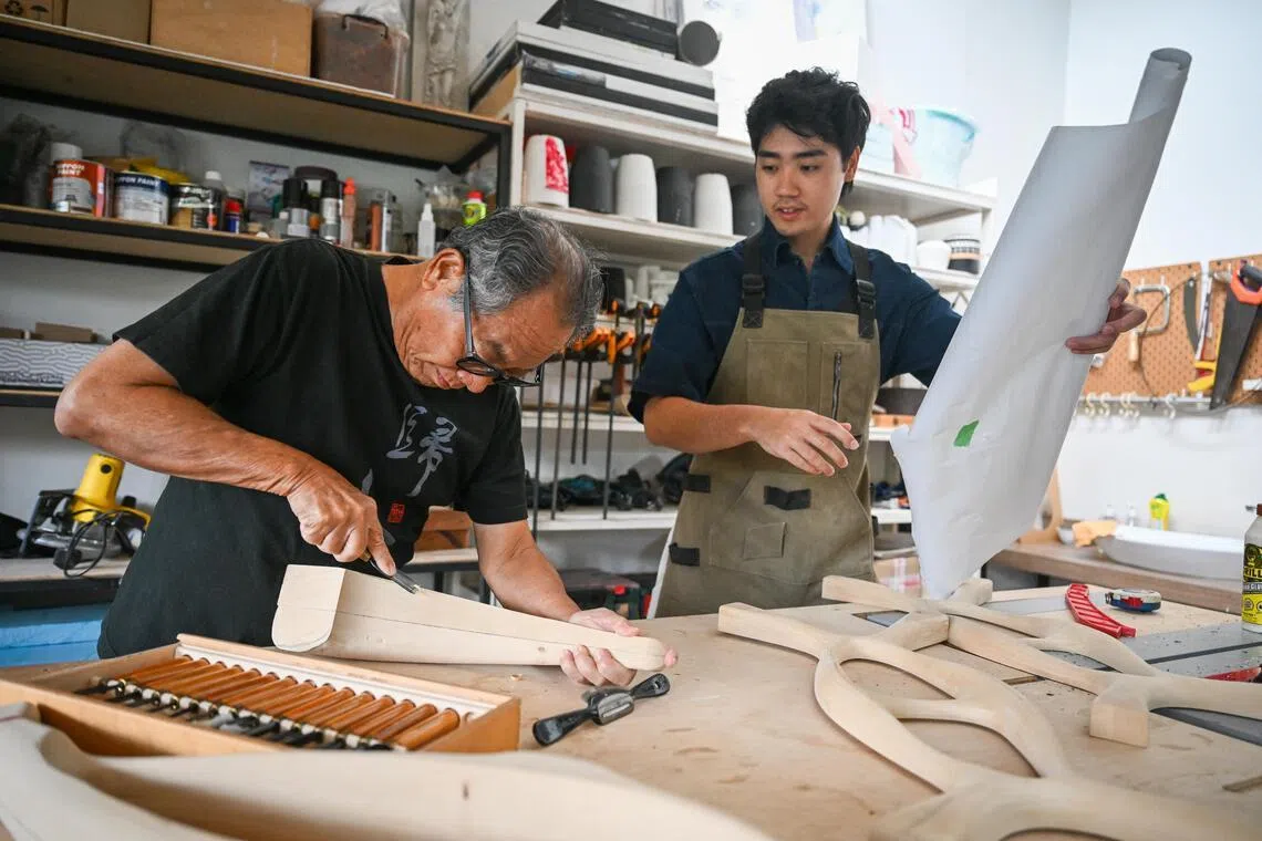 Tyson Hong and his grandfather Tan Cheng Whatt inspire each other when they work in Tan’s home carpentry workshop. A Medusa figurine, fashioned by Tan, is a mini-monument to his grit and inventiveness with furniture-making.