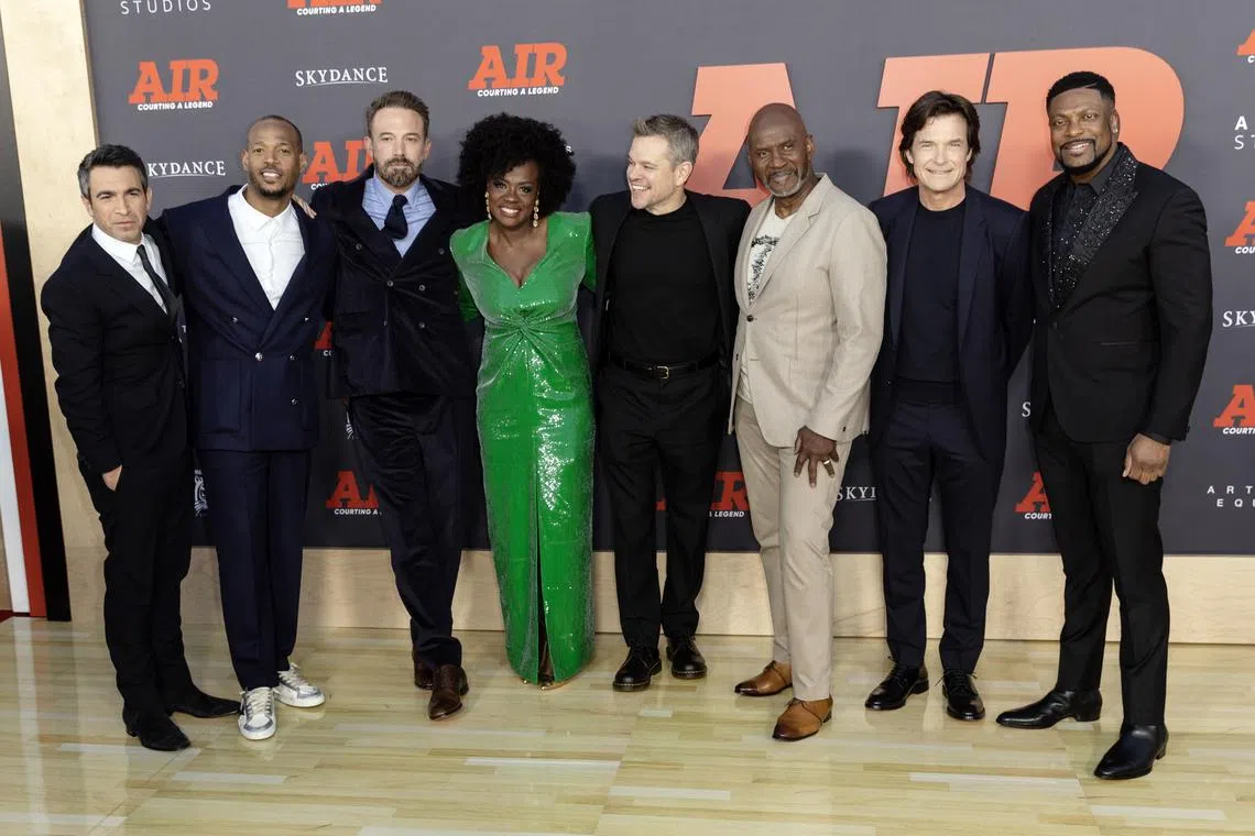 epa10546434 (L-R) Chris Messina, Marlon Wayans, Ben Affleck, Viola Davis, Matt Damon, Julius Tennon, Jason Bateman and Chris Tucker attend the premiere of ‘Air’ at the Regency Village Theatre in Los Angeles, California, USA, 27 March 2023. The movie with be released in theaters on April 5, 2023.  EPA-EFE/ETIENNE LAURENT