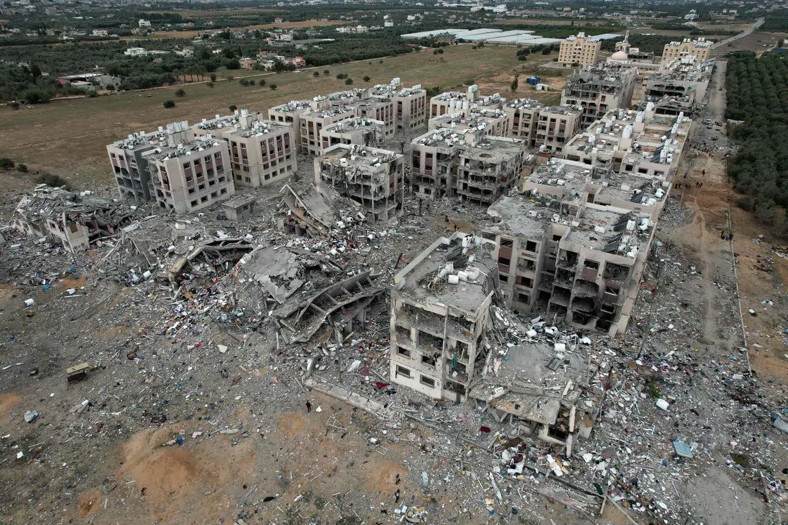 An aerial view shows the destruction caused by Israeli strikes in Wadi Gaza, in the central Gaza Stri, Nov 28, amid a truce in battles between Israel and Hamas. Israel and Hamas embarked on a two-day extension on Nov 28.