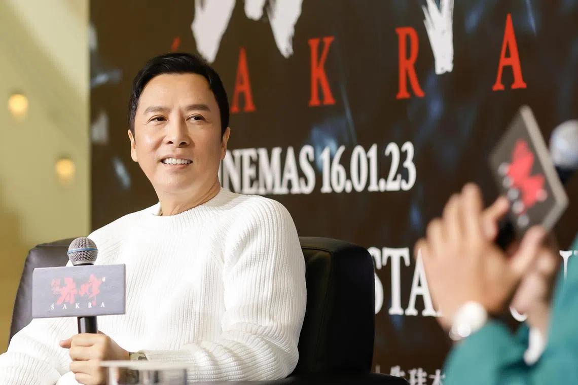 Donnie Yen speaks at a press conference to promote his new film Sakra, at Marina Bay Sands Theatre.