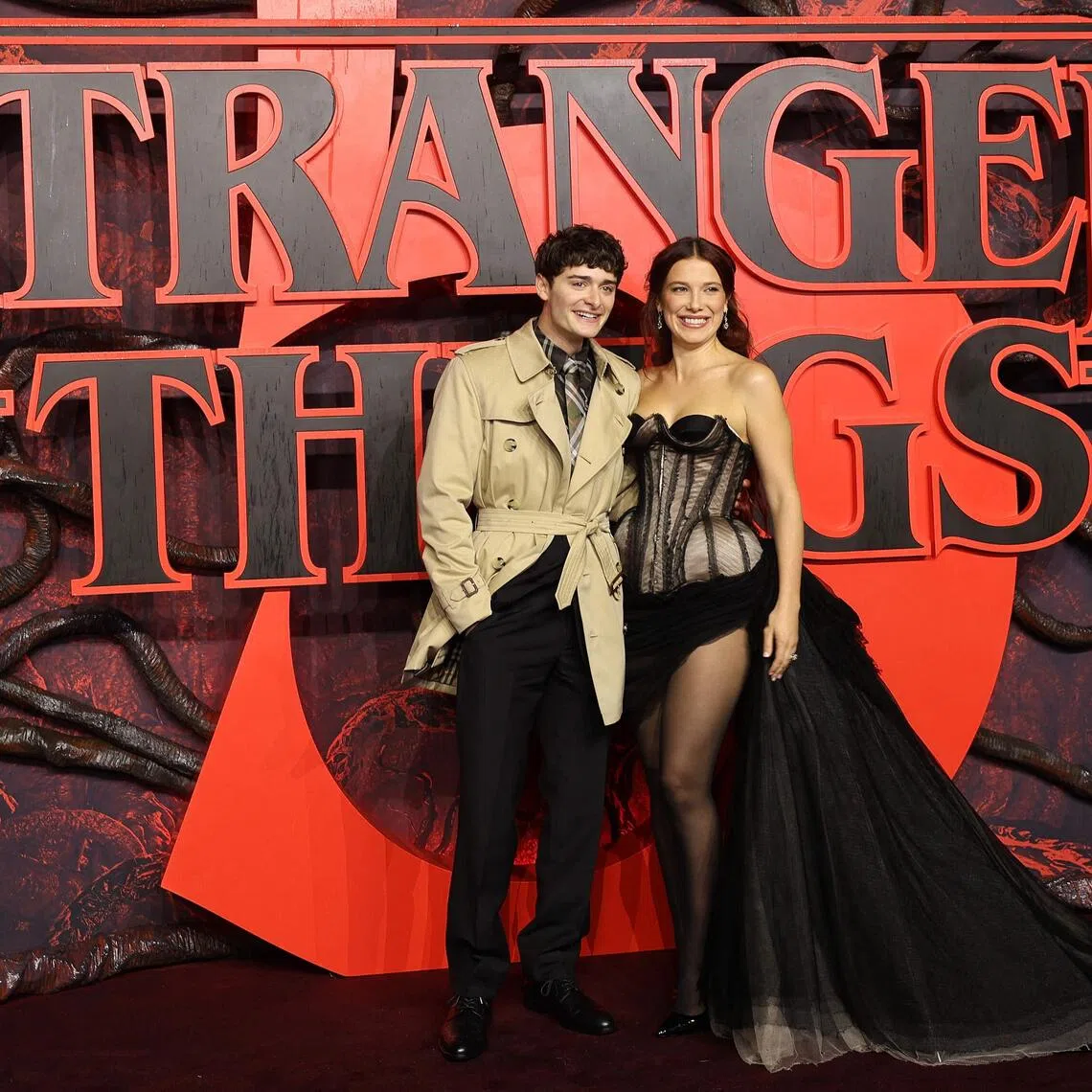 Actors Noah Schnapp (left) and Millie Bobby Brown at Stranger Things 5's premiere in London on Nov 13, 2025.