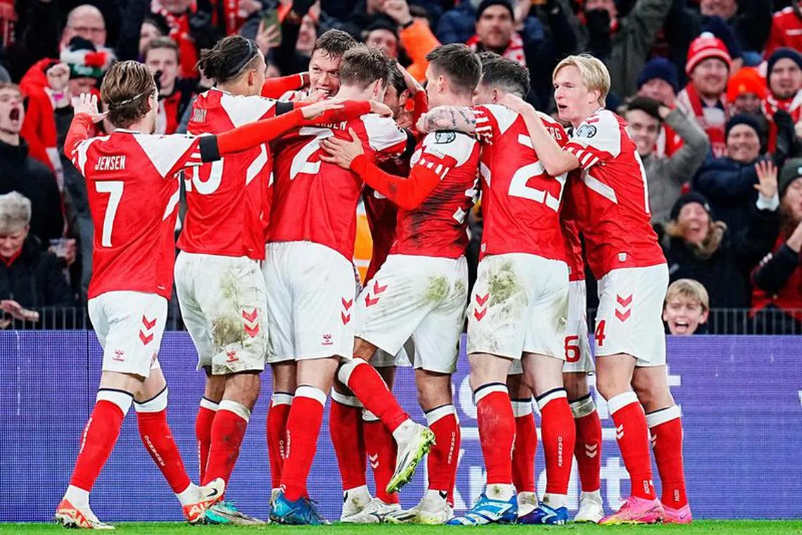 Soccer Football - UEFA Euro 2024 Qualifier - Group H - Denmark v Slovenia - Parken Stadium, Copenhagen, Denmark - November 17, 2023  Denmark's Thomas Delaney celebrates scoring their second goal with teammates   Liselotte Sabroe/Ritzau Scanpix via REUTERS