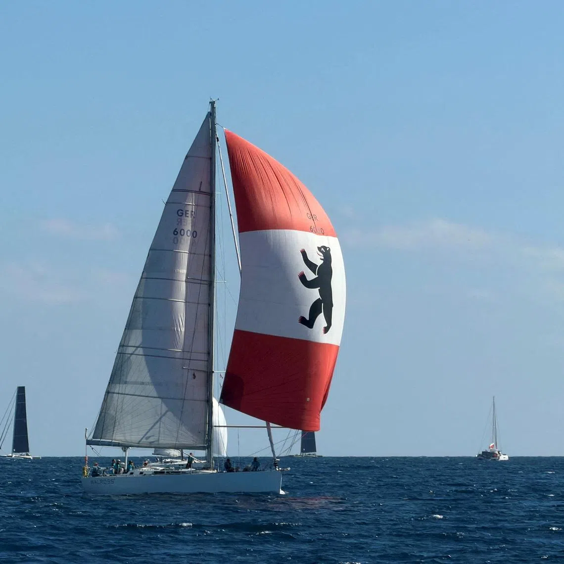 FILE PHOTO: Sailing - 2026 RORC Transatlantic Race - Arrecife, Lanzarote, Spain - January 11, 2026 Walross 4, crewed by German students, fly the Bavarian bear on their spinnaker as they start the  RORC Transatlantic Race from Lanzarote to Antigu REUTERS/Ossian Shine/File Photo