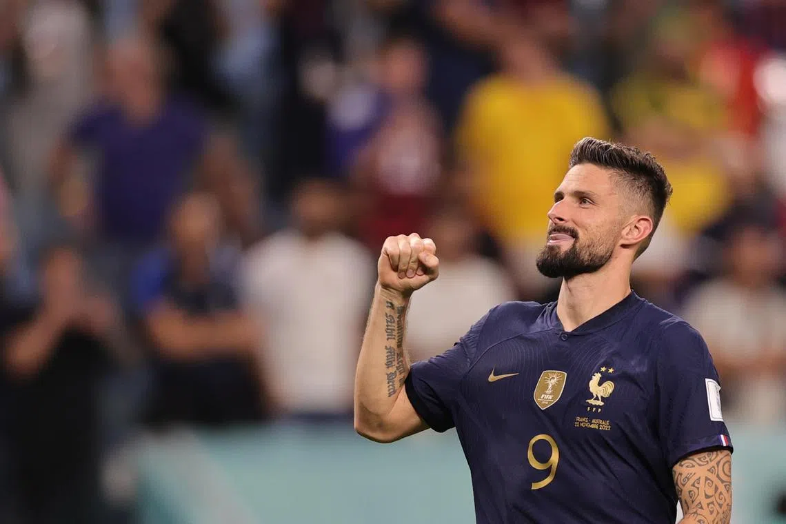 Olivier Giroud celebrates France's 4-1 win over Australia, which saw him score a double.