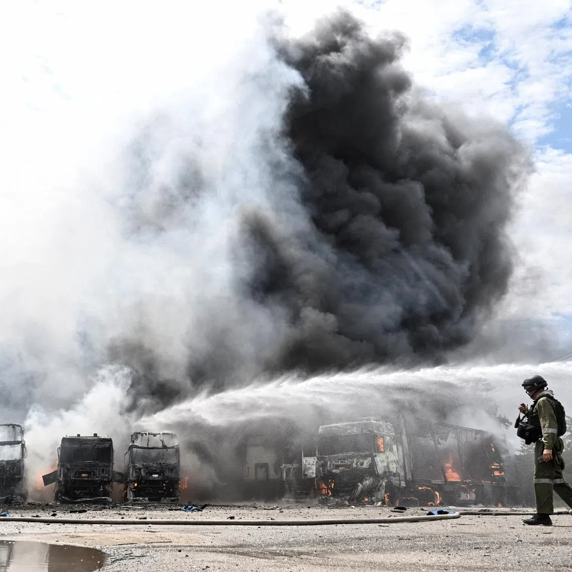 Firefighters work at the site of a Russian drone strike, amid Russia's attack on Ukraine, in Zaporizhzhia, Ukraine June 25, 2026. REUTERS/Stringer
