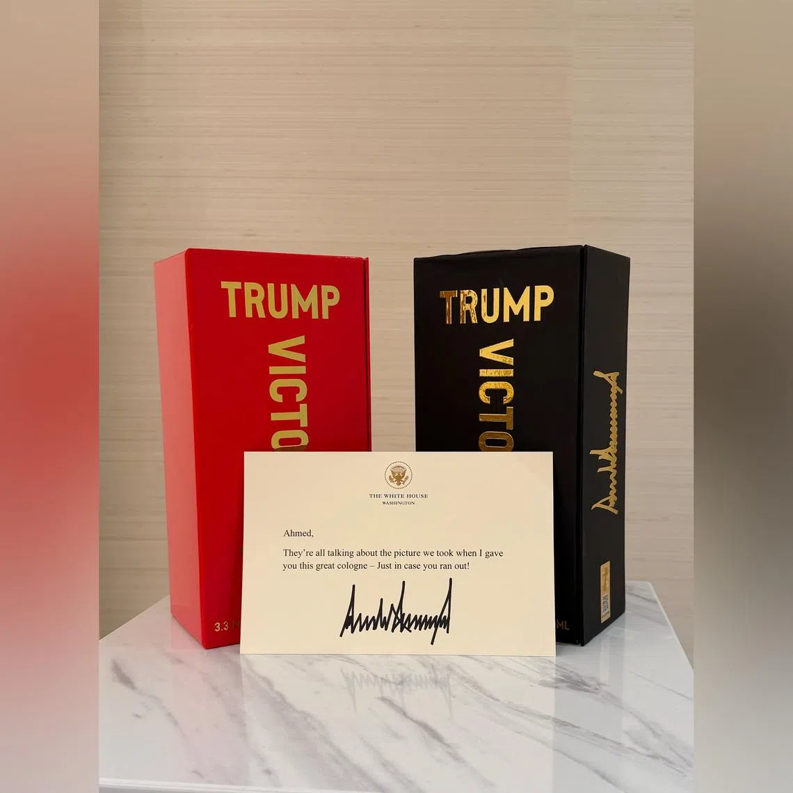 Syrian leader Ahmed al-Sharaa posted an image of two Trump-branded fragrance boxes, one red and the other black.
