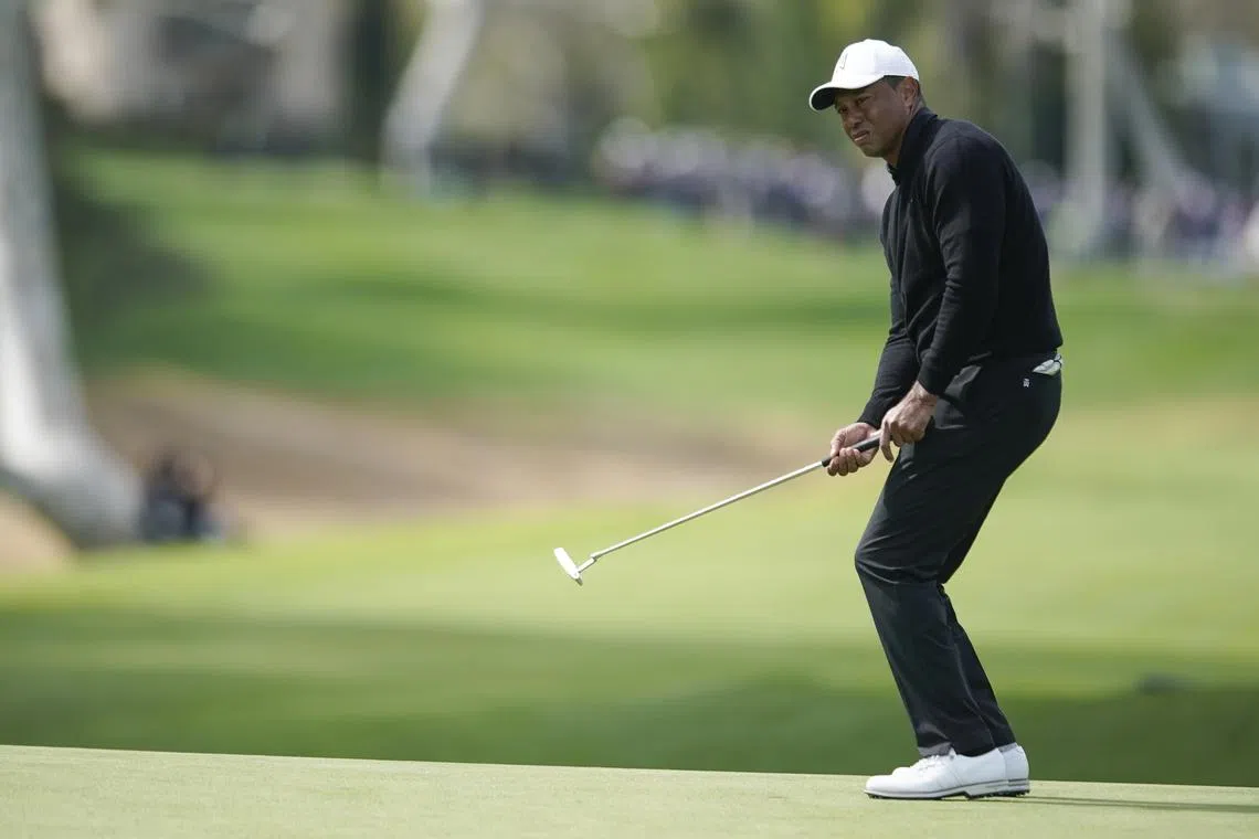 US golfer Tiger Woods reacts after putting on the 7th hole during round 2 of the Genesis Invitational at the Riviera Country Club in Los Angeles, California, USA, 17 February 2023.  EPA-EFE/CAROLINE BREHMAN
