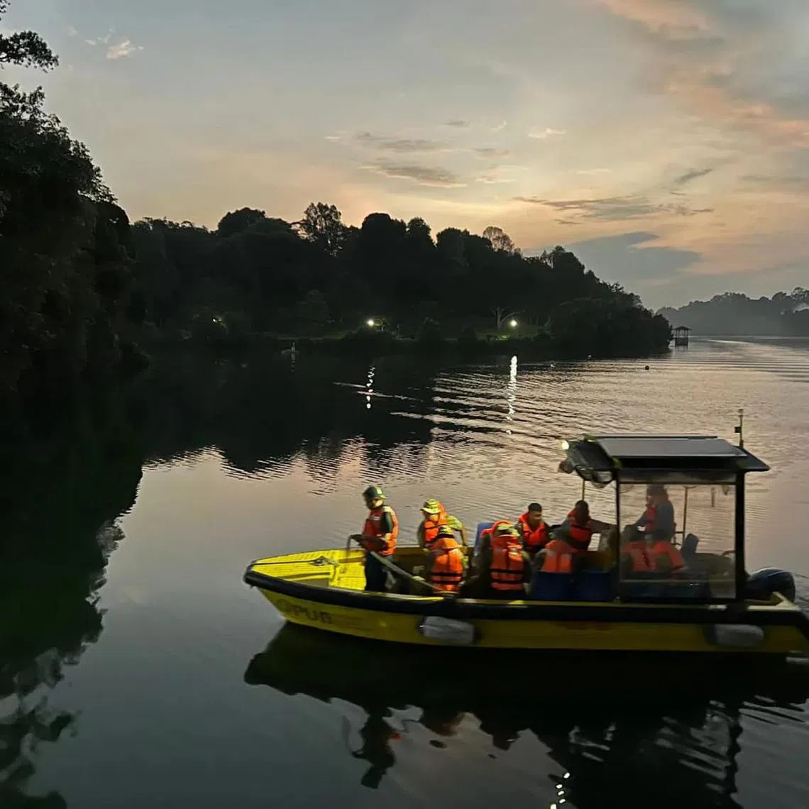 Gurkha search team traversing across reservoir on a PUB Boat.