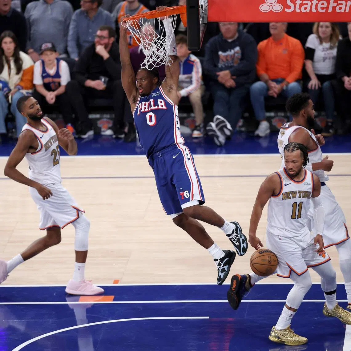 Tyrese Maxey (in blue) of the Philadelphia 76ers scored a game-high 28 points as the Sixers beat defending NBA champions New York Knicks.