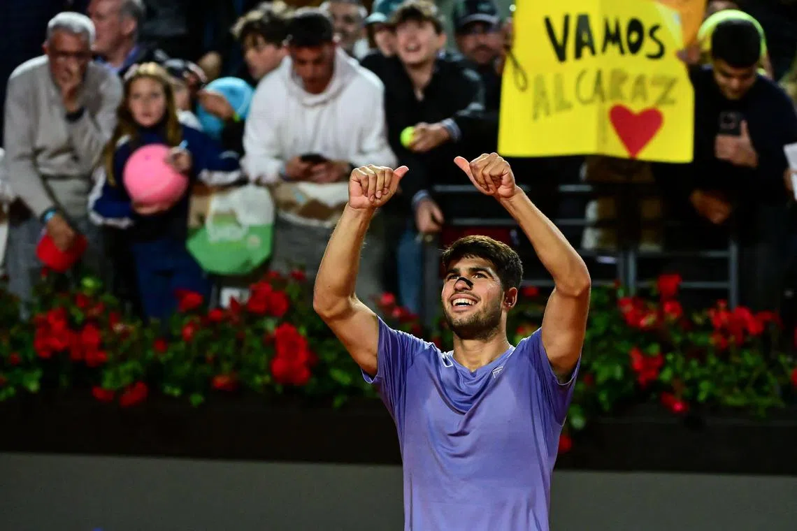Spain's Carlos Alcaraz celebrates after winning against Serbia's Laslo Djere at the Italian Open.