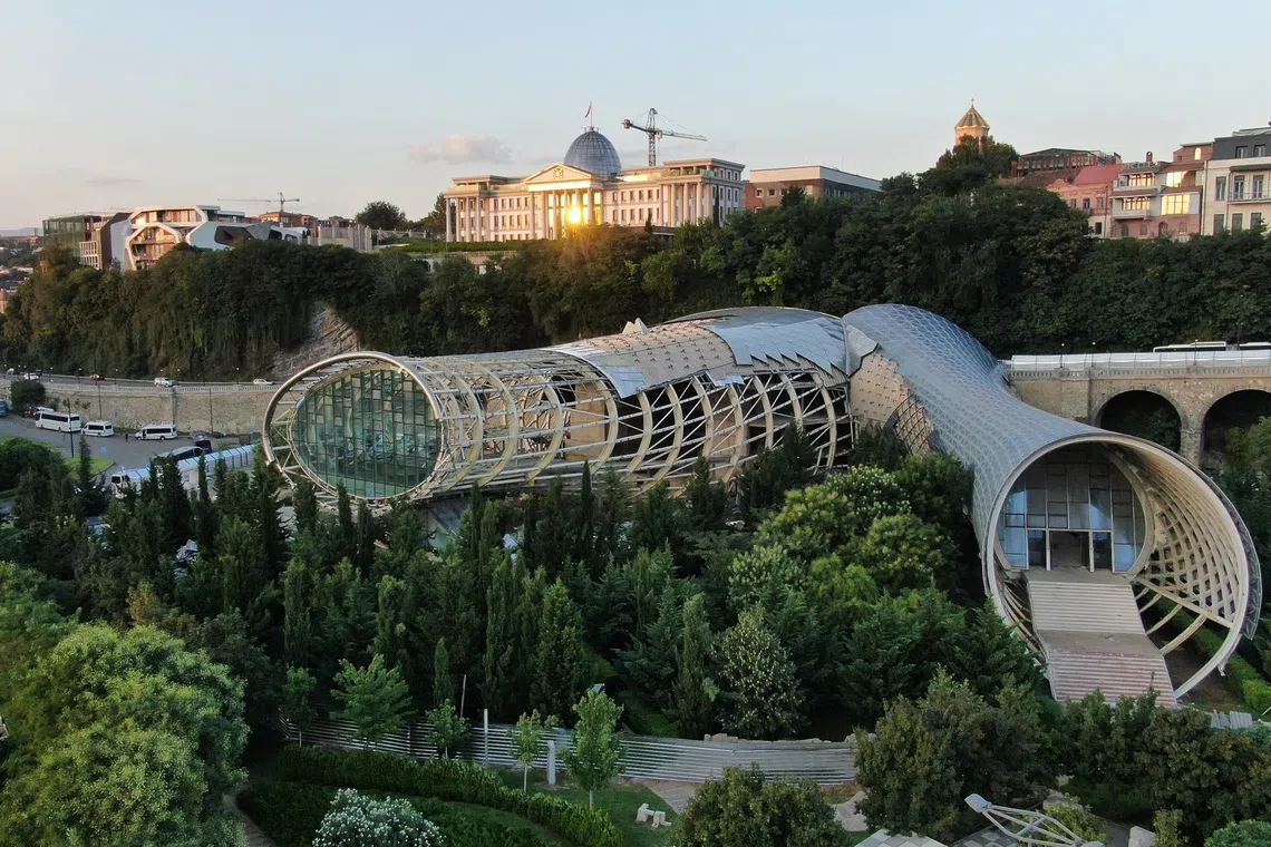 A drone view of the complex known as \"Rike Tubes\", designed by the Italian architectural firm Studio Fuksas and built to house the Rike Park Music Theatre and Exhibition Hall, but never put into use and now being demolished, in Tbilisi, Georgia August 21, 2026. REUTERS/Irakli Gedenidze