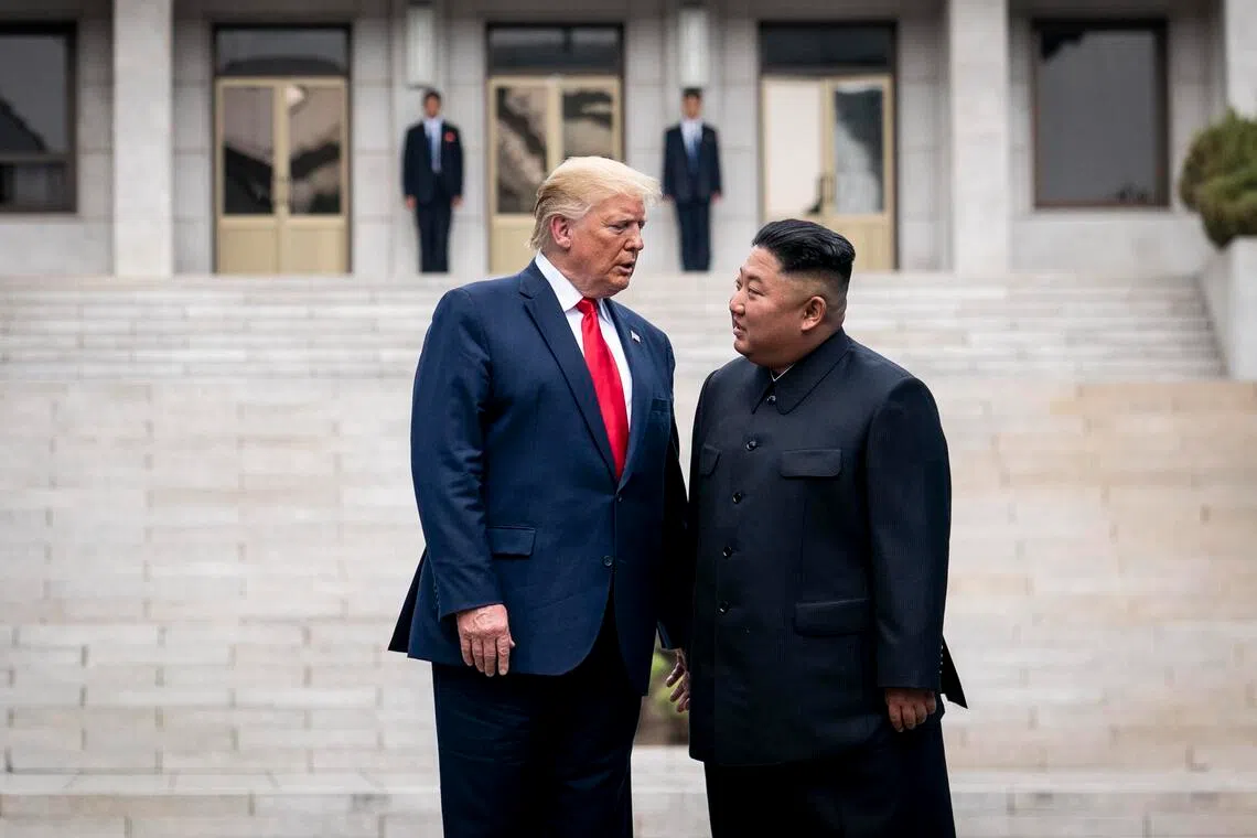 FILE — President Donald Trump with Kim Jong-un, North Korea’s leader, on the North Korean side of the Demilitarized Zone between North and South Korea, at Panmunjom, June 30, 2019. North Korea’s leader, in remarks reported by state media on Monday, Sept. 22, 2025, said he had “good memories” of President Trump and ​saw no reason not to meet him again — as long as the United States stops insisting on dismantling his country’s nuclear arsenal. (Erin Schaff/The New York Times)