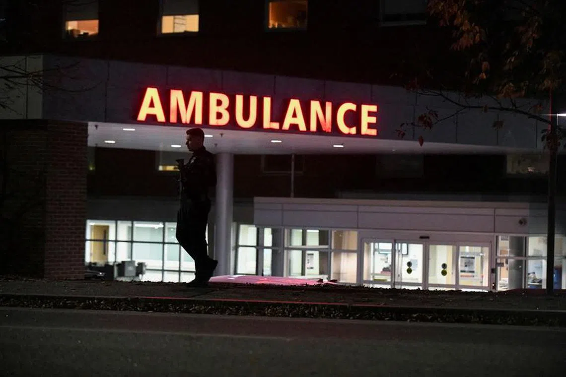 Police patrol outside the Central Maine Medical Center after deadly mass shootings in Lewiston, Maine, U.S. October 26, 2023.  REUTERS/Nicholas Pfosi