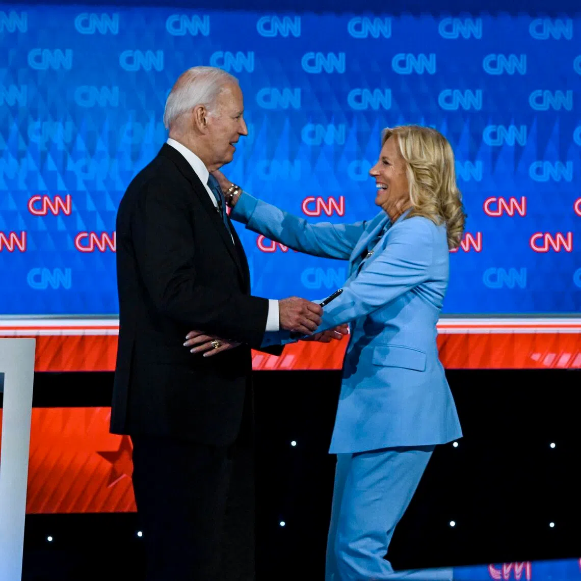 Then US president Joe Biden and first lady Jill Biden embrace after his debate with Mr Donald Trump in Atlanta on June 27, 2024.  