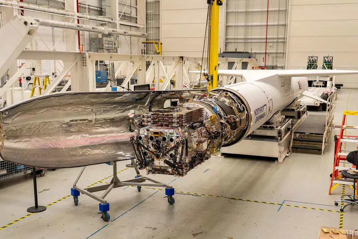 A spacecraft built by space startup Katalyst Space that will tow NASA's Neil Gehrels Swift Observatory into a higher orbit awaits encapsulation aboard a Northrop Grumman Pegasus XL at NASA's Wallops Flight Facility in Virginia, U.S. June 8, 2026. REUTERS/NASA/Ron Beard