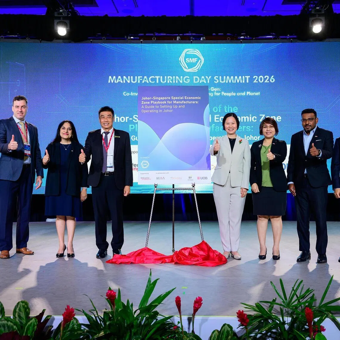 The Johor-Singapore Special Economic Zone playbook was launched by Singapore Manufacturing Federation (SMF) president Lennon Tan (fourth from left) and Minister of State for Trade and Industry Gan Siow Huang (fourth from right) at the SMF manufacturing day summit on Jan 30.