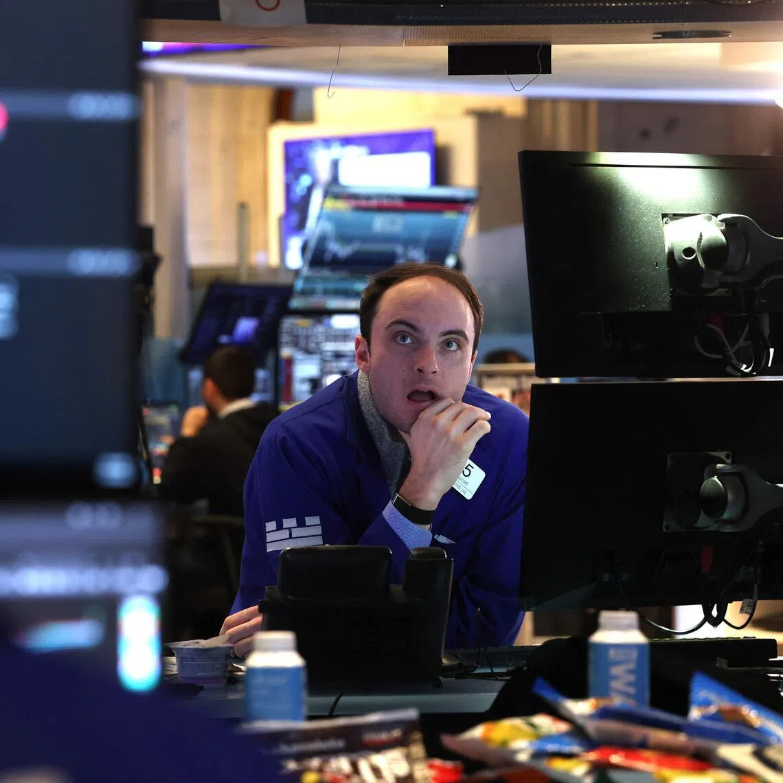 Traders working on the floor of the New York Stock Exchange, at the opening bell on Jan 23, in New York City.