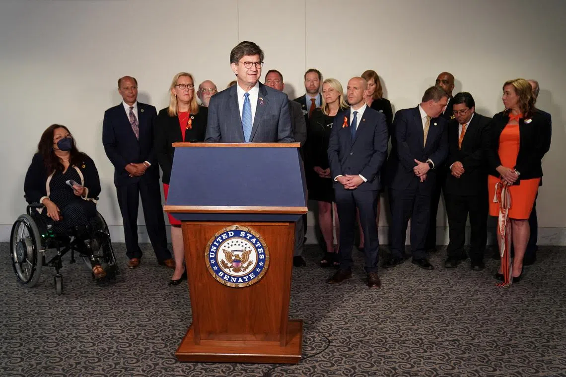 FILE PHOTO: Rep. Brad Schneider (D-IL), surrounded by Highland Park community leaders, speaks at a news conference following a Senate Judiciary Committee hearing on assault weapons on Capitol Hill in Washington, U.S., July 20, 2022. REUTERS/Sarah Silbiger/File Photo