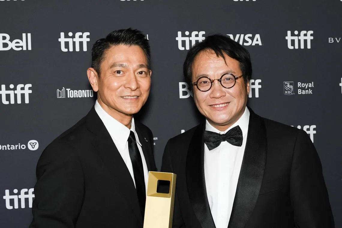 TORONTO, ONTARIO - SEPTEMBER 15: (L-R) Andy Lau and Ning Hao attend "The Movie Emperor" Awards Ceremony Reception during the 2023 Toronto International Film Festiva at Roy Thomson Hall on September 15, 2023 in Toronto, Ontario.   Harold Feng/Getty Images/AFP (Photo by Harold Feng / GETTY IMAGES NORTH AMERICA / Getty Images via AFP)
