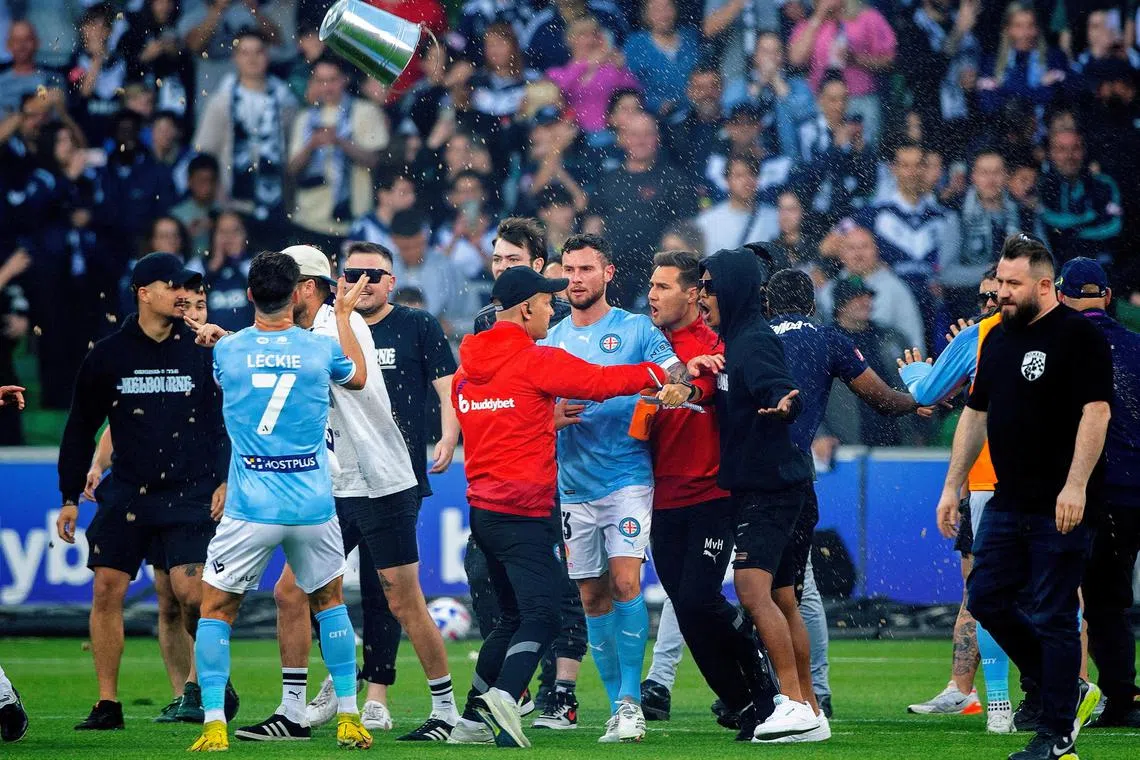 Melbourne City and Melbourne Victory players at an A-League match in December 2022.