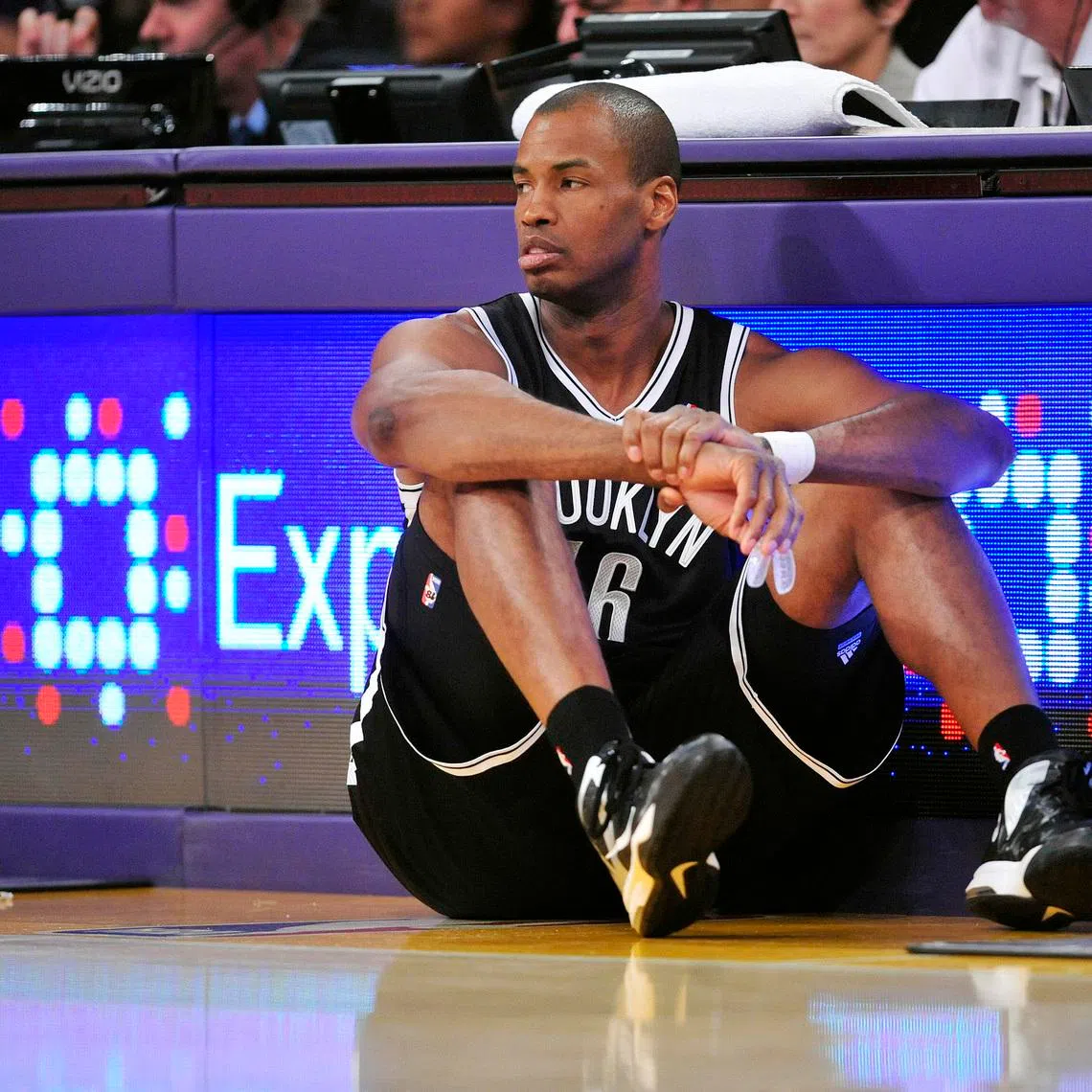 NBA player Jason Collins, pictured during a match for the Brooklyn Nets, has died at the age of 47 after battling cancer.