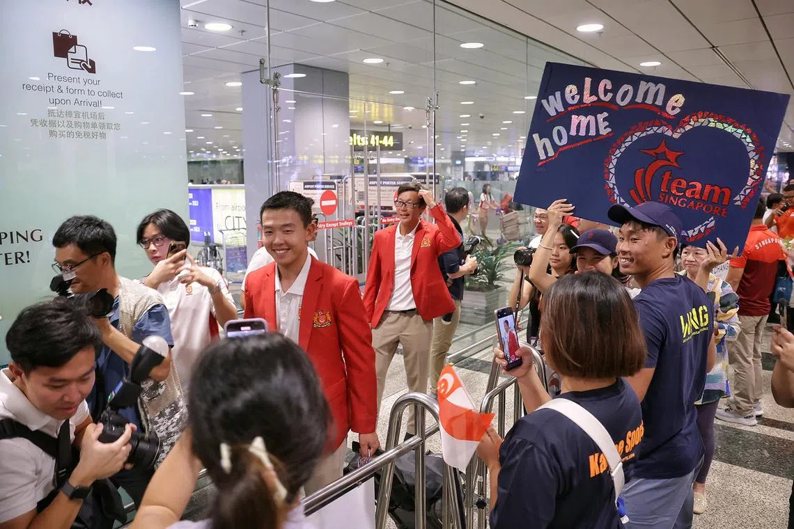 Fellow sailor Ryan Lo, who competed in the men’s dinghy event, arriving at Changi Airport.