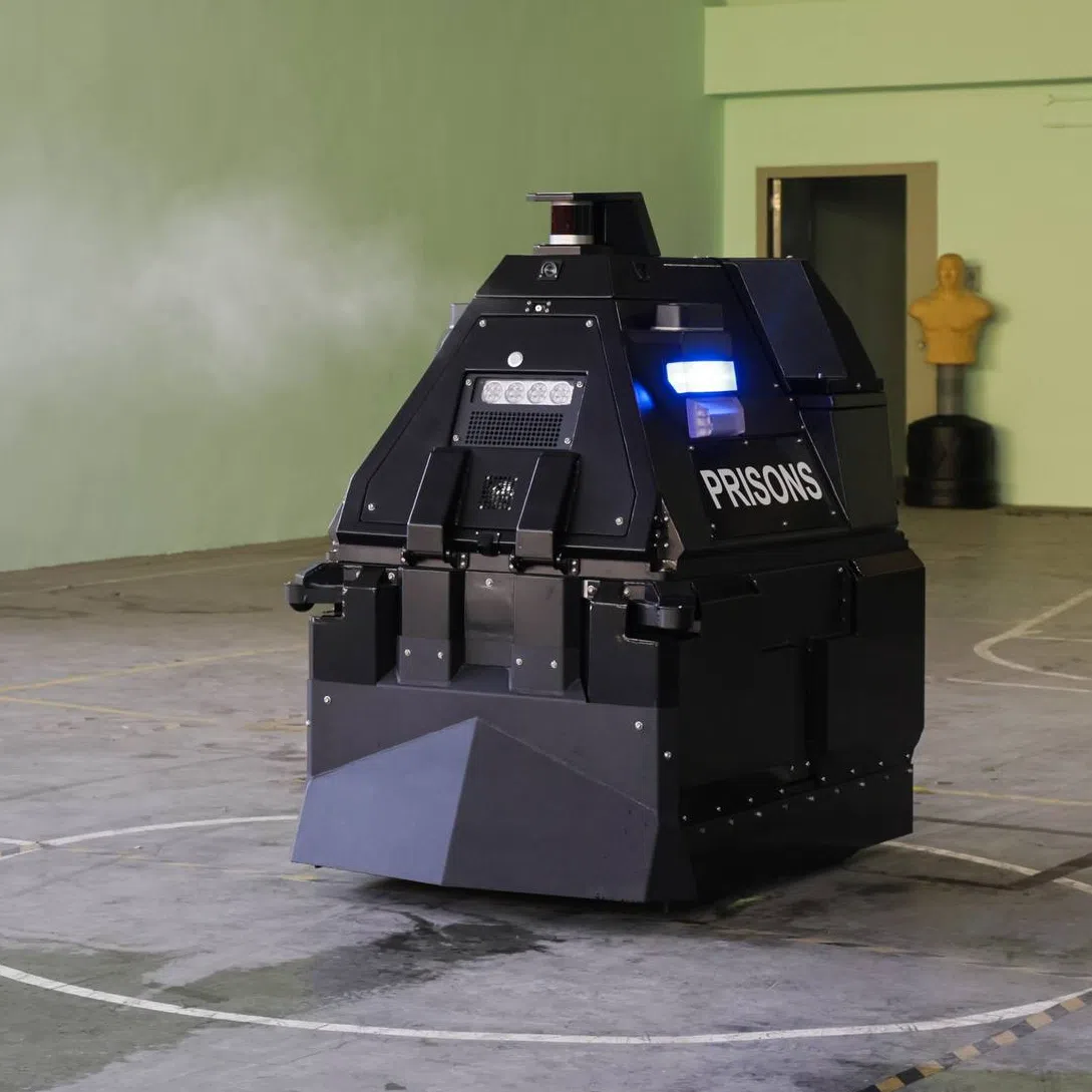 The robot called PROTECT developed by the Singapore Prison Service and Home Team Science and Technology Agency during a media preview at Changi Prison Complex on Sept 3.