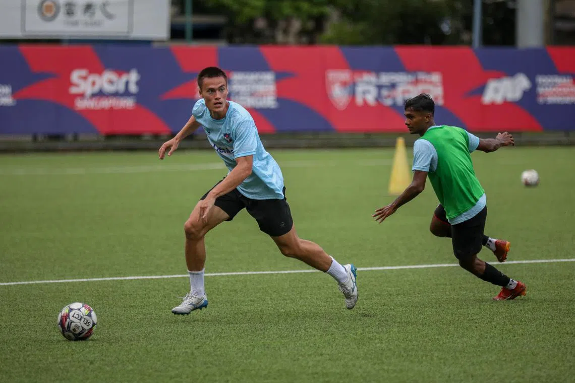 ST20240926_202439400418/dgspl27/Luther Lau/Deepanraj A C Ganesan/

Story Background:
If Ryhan Stewart had it his way, he would be in Europe battling for a place in the Austrian league but the reality is that the 24-year-old Singaporean fullback is back in Singapore after his Thai stint and now hoping to help Albirex Niigata climb the Singapore Premier League table.

Action shots of Ryhan Stewart (In Blue), 24 who plays for Albirex Niigata FC during training. Taken at Jurong East Stadium.