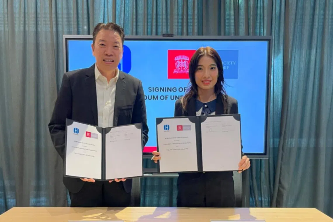 Case president Melvin Yong and Law Society president Lisa Sam formalised the collaboration with the signing of a Memorandum of Understanding.