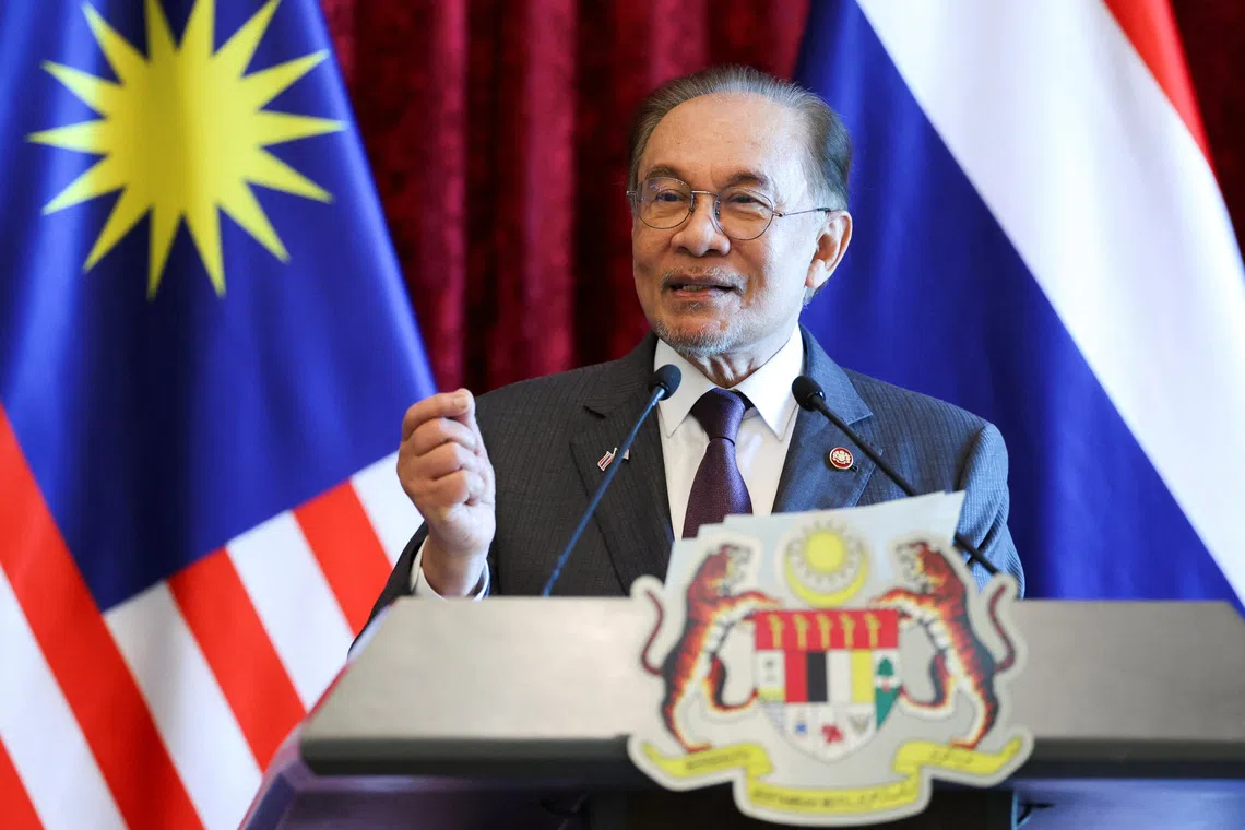Malaysian ruling bloc party to review role in government on Aug 16