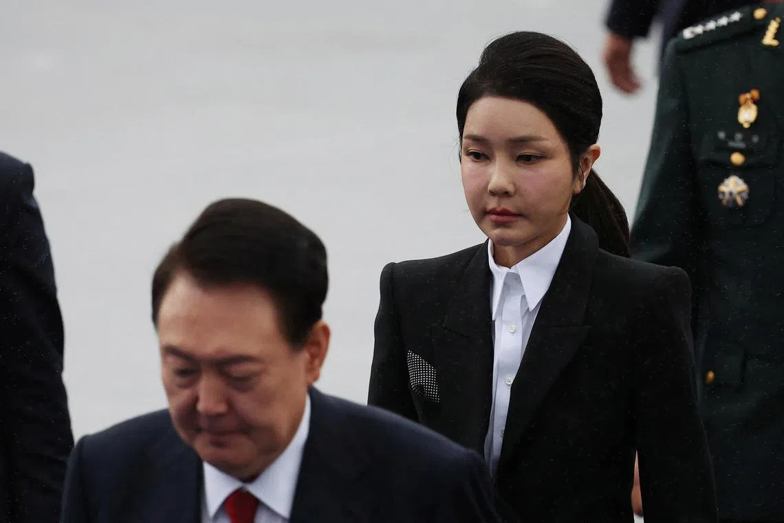 South Korean President Yoon Suk Yeol and his wife Kim Keon Hee arrive for a celebration to mark 76th anniversary of Korea Armed Forces Day, in Seongnam, South Korea, October 1, 2024. REUTERS/Kim Hong-Ji/Pool/File Photo