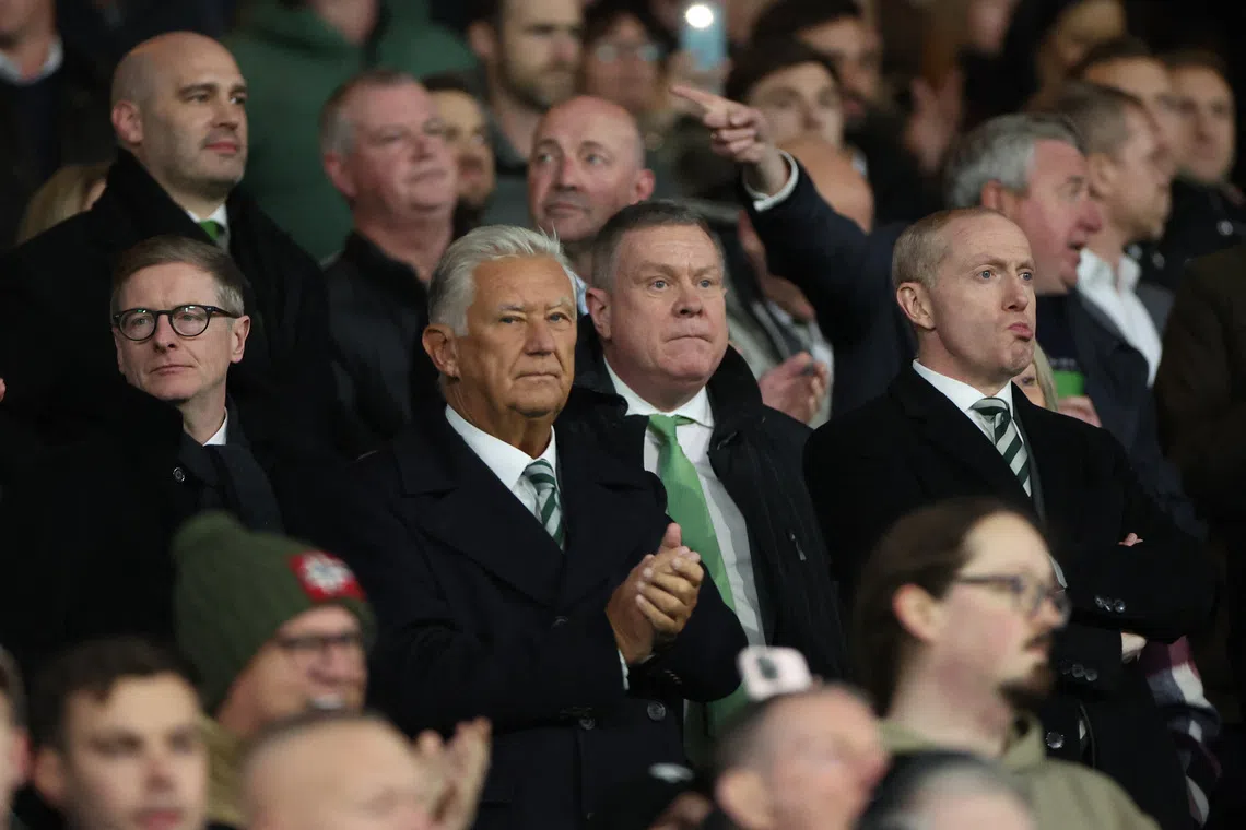 Soccer Football - Scottish Premiership - Celtic v Falkirk - Celtic Park, Glasgow, Scotland, Britain - October 29, 2025 Celtic non executive chairman Peter Lawwell and chief executive Michael Nicholson in the stands before the match REUTERS/Russell Cheyne