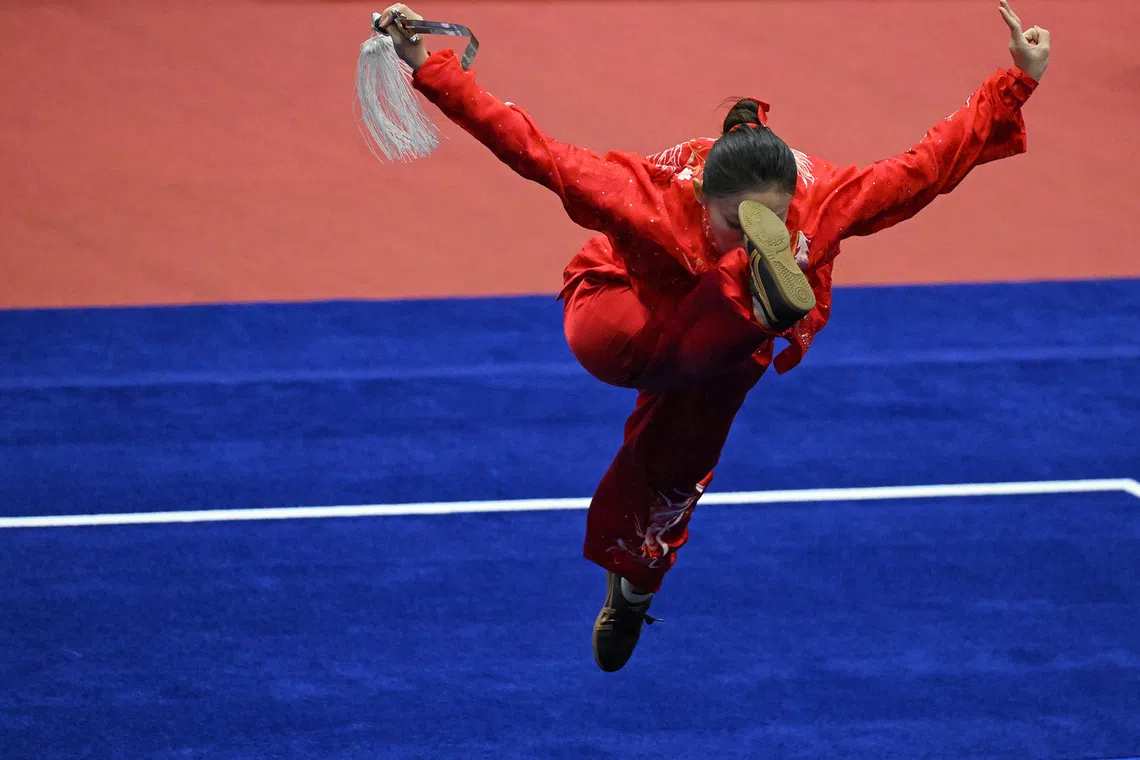 Zeanne Law of Singapore in action during the Wushu Women’s Taijiquan and Taijijian (Taijijian segment) Final held at the Aichi Prefectural Martial Arts Hall on Sept 20, 2026.
