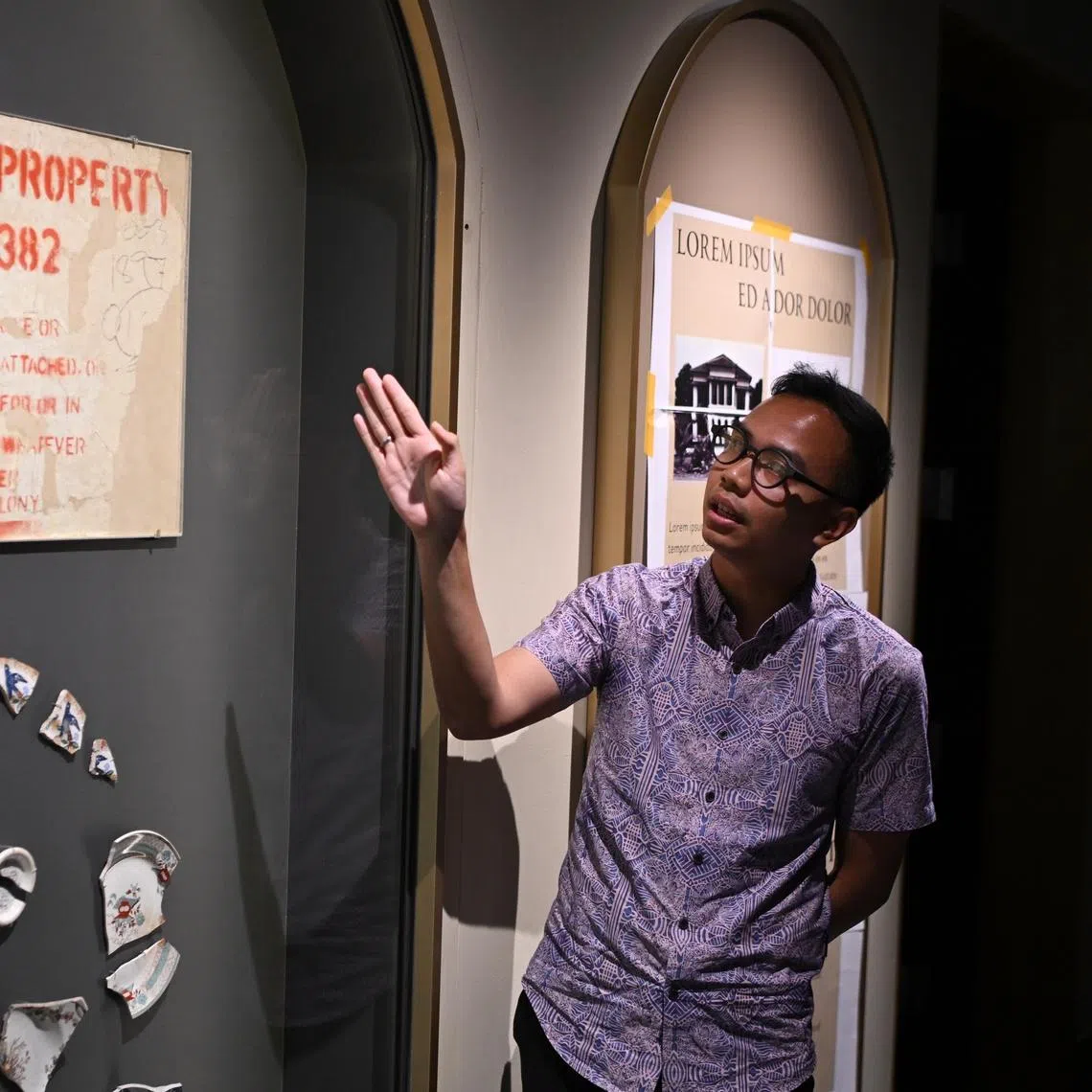 Malay Heritage Centre assistant curator Hadi Osni sharing about a stencilled sign dated 1897 which was uncovered during restoration works for the centre.
