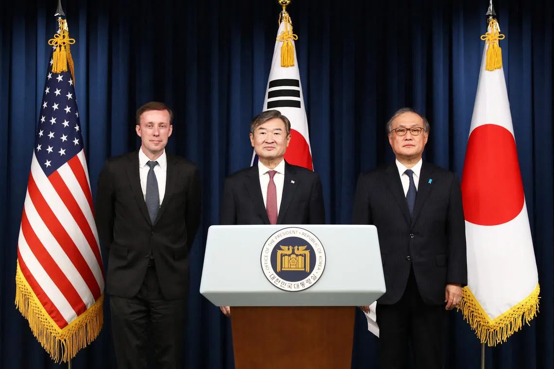 (From left) US National Security Advisor Jake Sullivan, South Korea's National Security Adviser Cho Tae-yong and Japan's National Security Secretariat Secretary-General Takeo Akiba met in Seoul on Dec 9.
