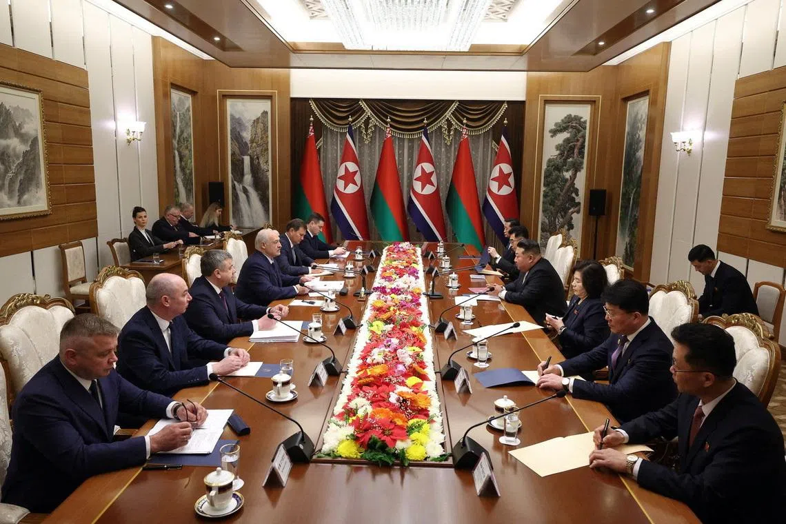 Belarusian President Alexander Lukashenko and North Korean leader Kim Jong Un attend a meeting in Pyongyang, North Korea March 26, 2026. President of the Republic of Belarus/Handout via REUTERS